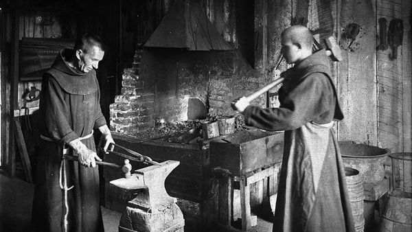 Two Monks Working In The Blacksmith Shop At Mission Santa Barbara Ca