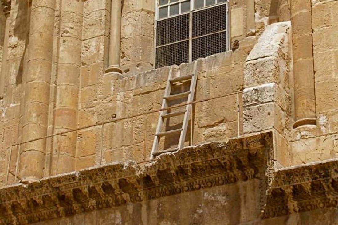 Immovable Ladder On Ledge Over Entrance To Church Of The Holy Sepulchre