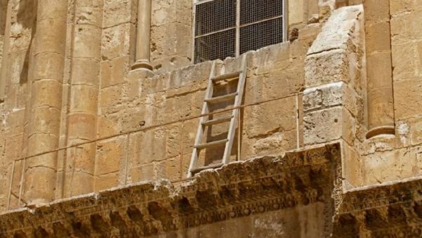 Immovable Ladder On Ledge Over Entrance To Church Of The Holy Sepulchre