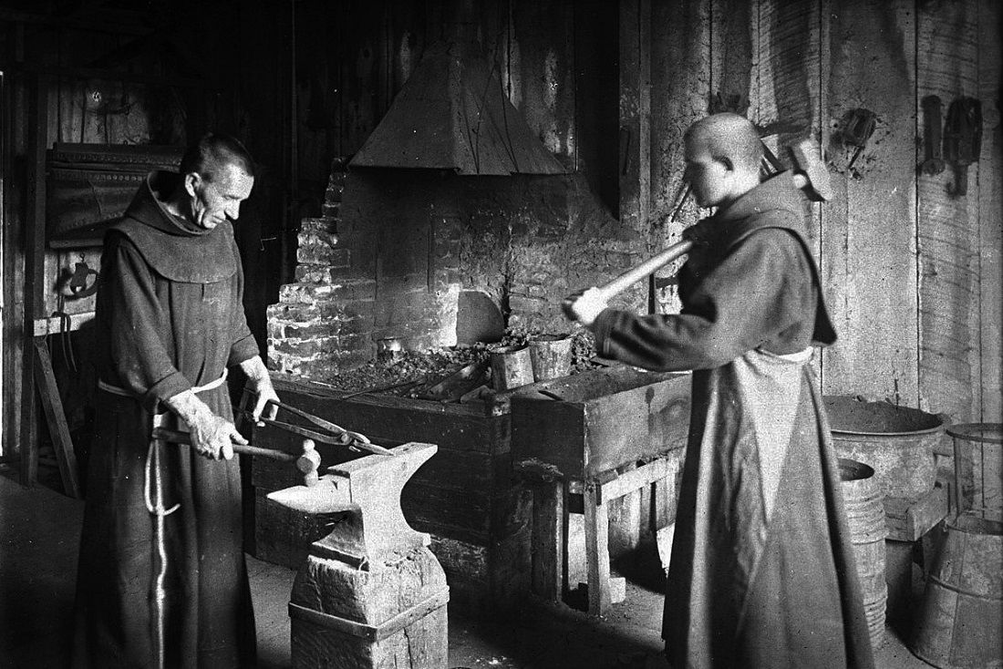 Two Monks Working In The Blacksmith Shop At Mission Santa Barbara Ca